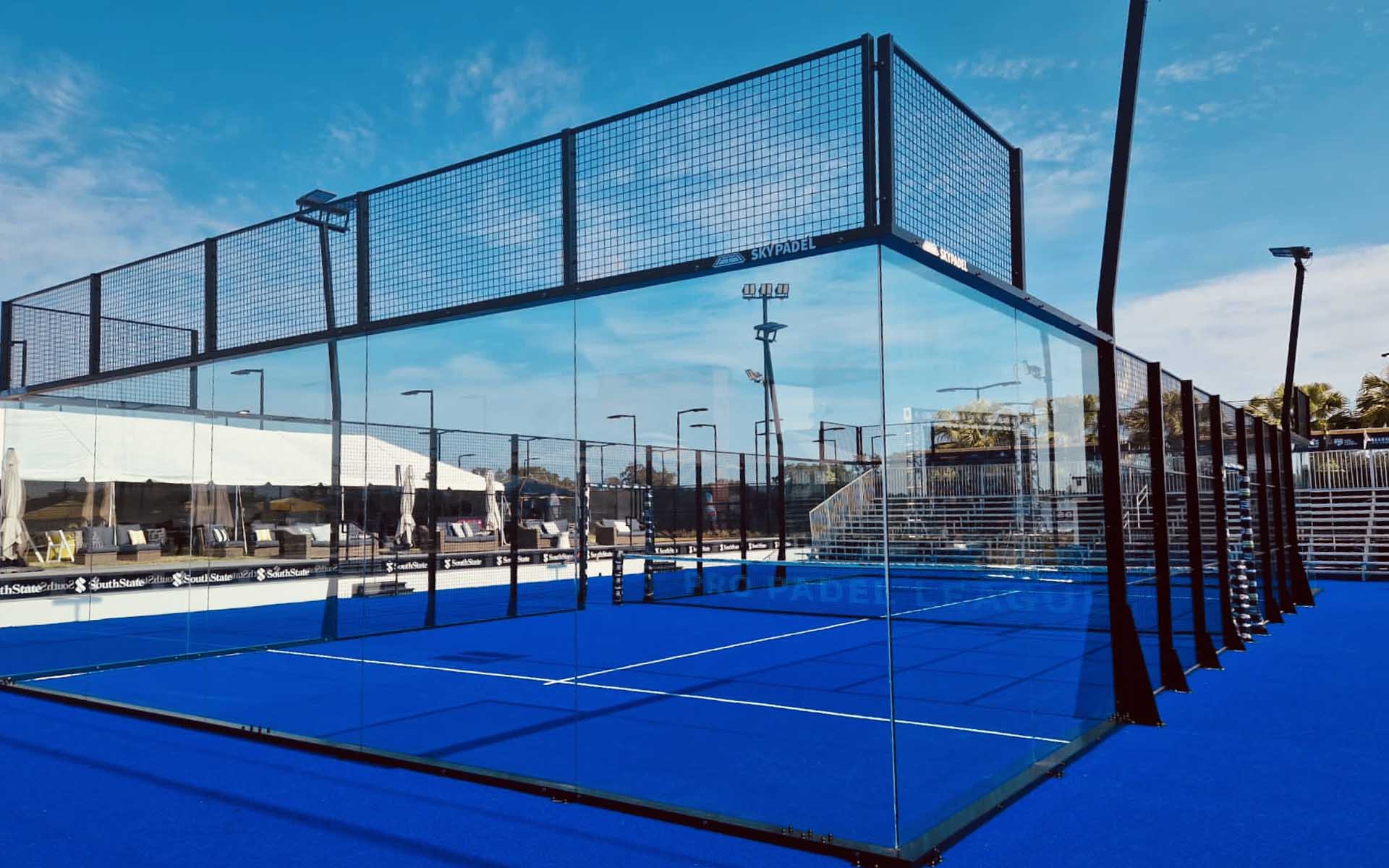 Installed ultra panoramic padel court in a premium outdoor venue.